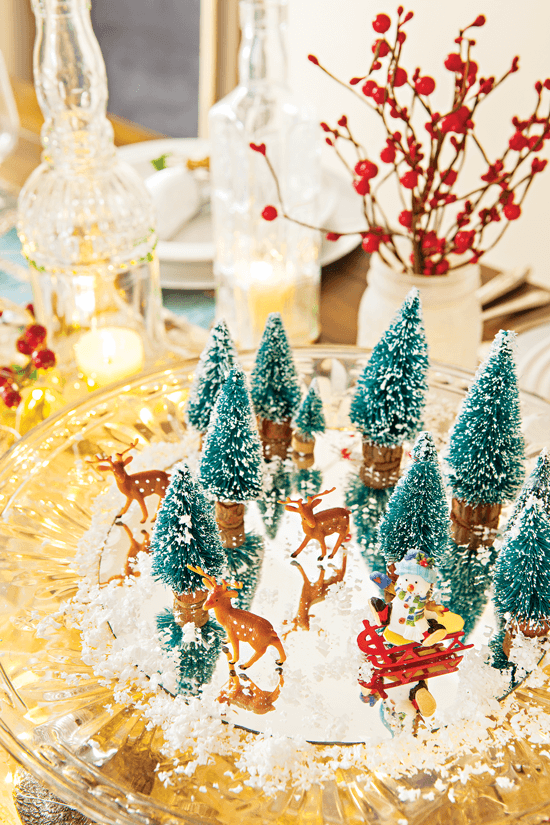 A cake plate becomes the display space for a tiny snowy setting. A mirror at the base makes it feel like an icy lake.