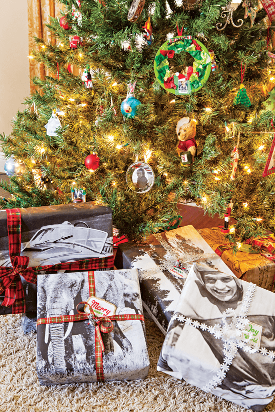 A unique way to wrap presents is to have engineering prints of your favorite family photos made at your local copier.