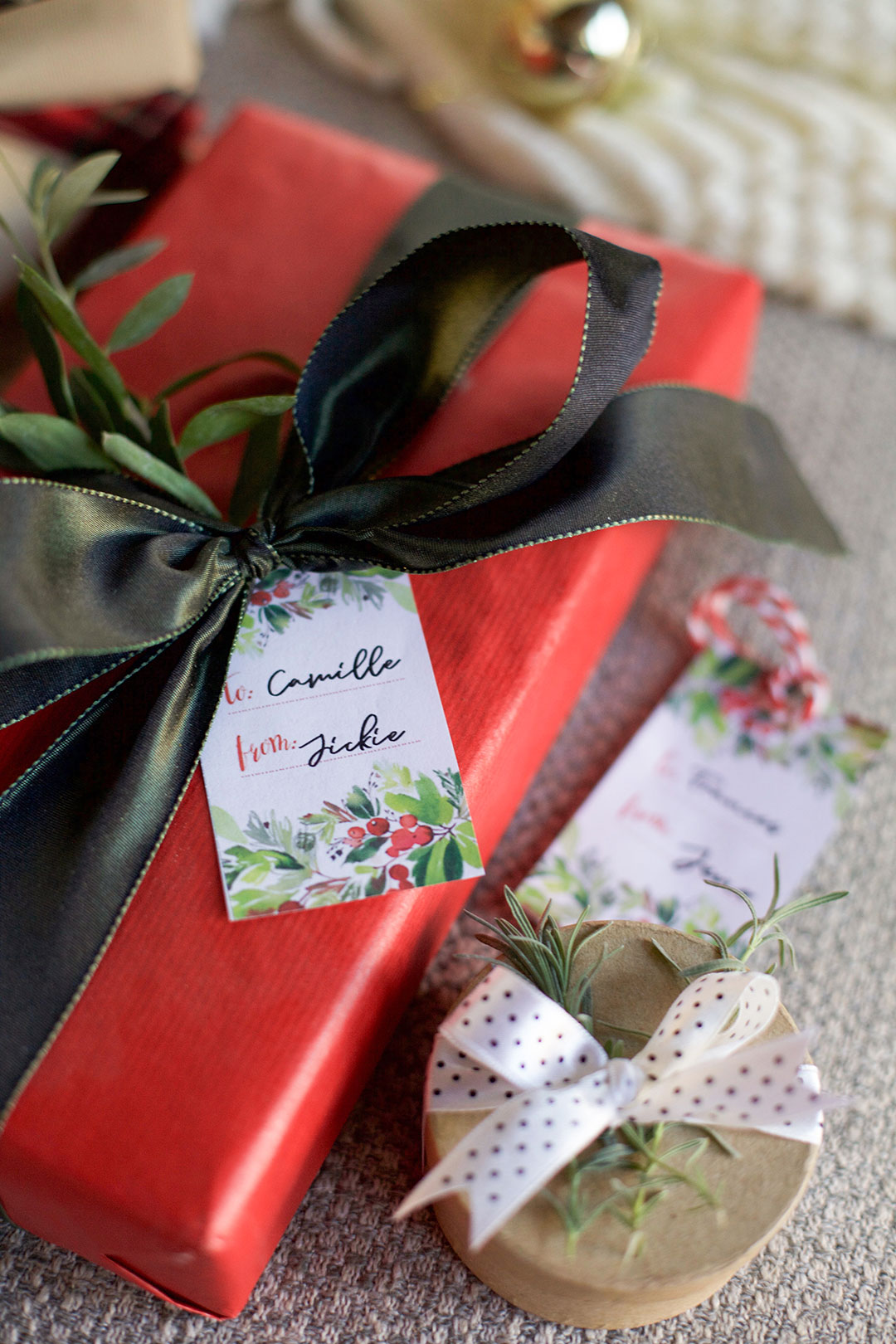 Wrapped Christmas gifts with cute printable tags