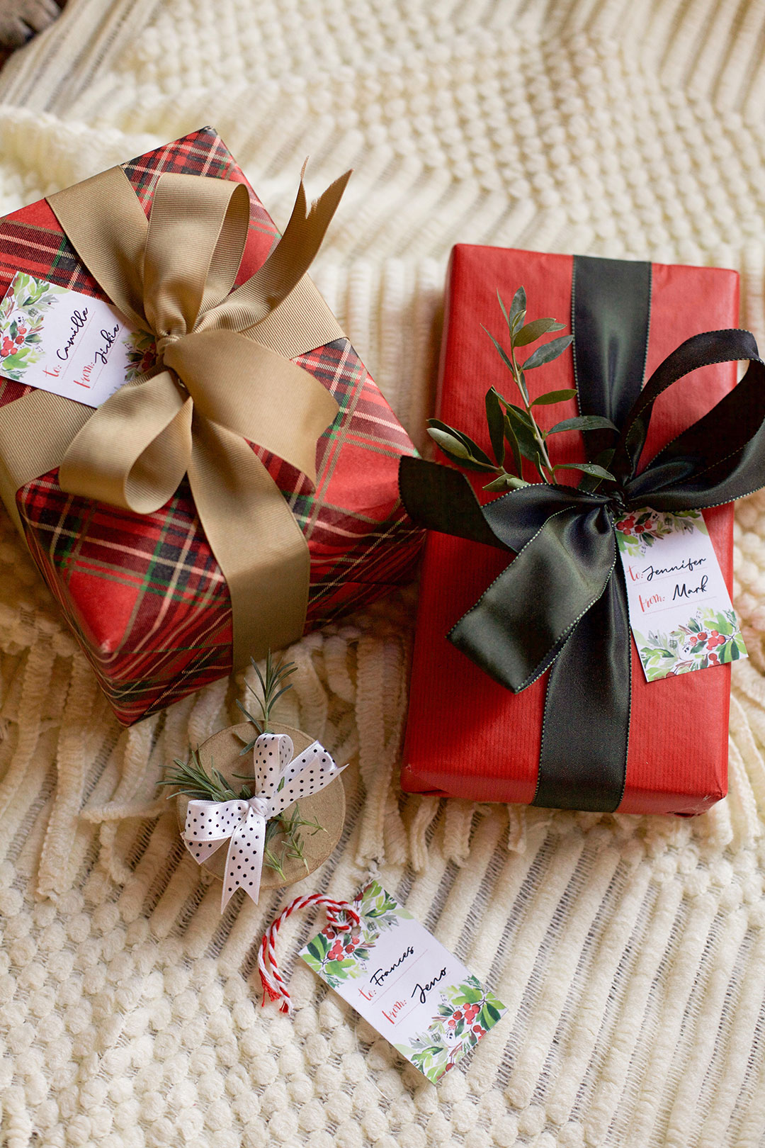 Wrapped Christmas gifts with name tags