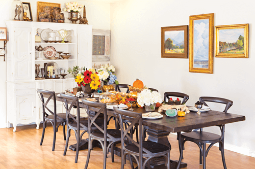 Dining room table decorated with vintage touches