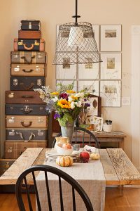 vintage trunks behind a simple fall table setting