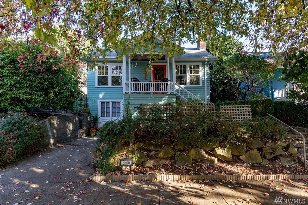 blue cottage with red door