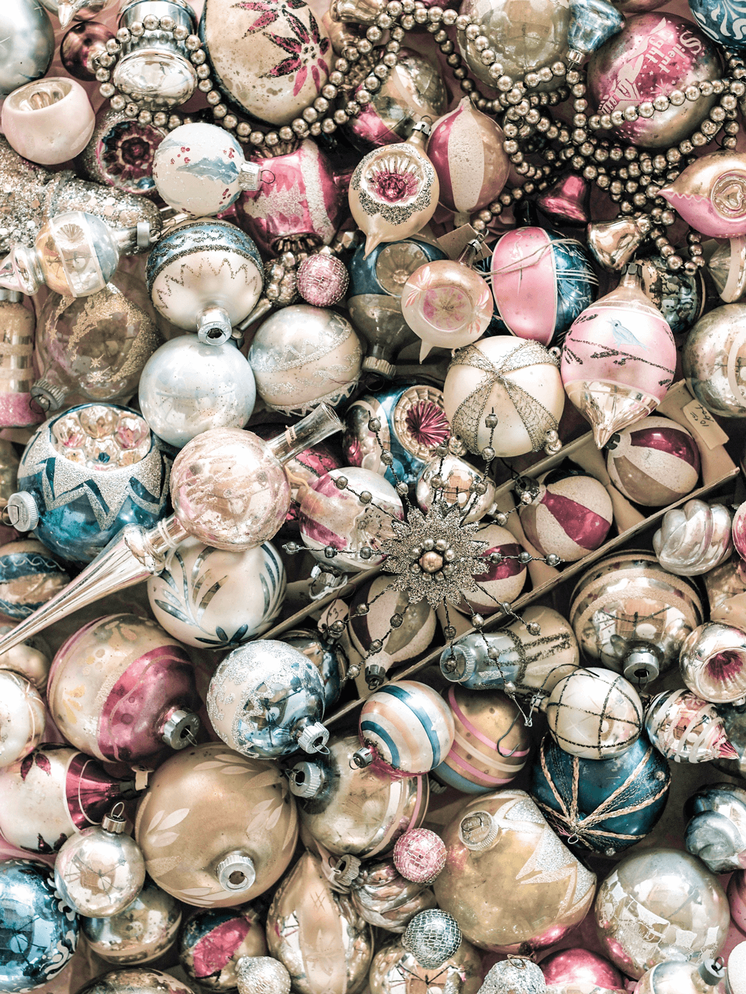 Antique glass Christmas ornaments in pink and blue are prefect for a Shabby Chic Christmas