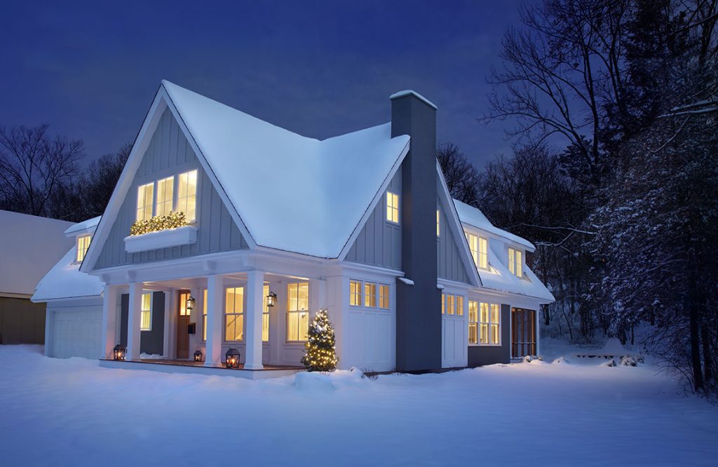 snowy cottage with green building techniques