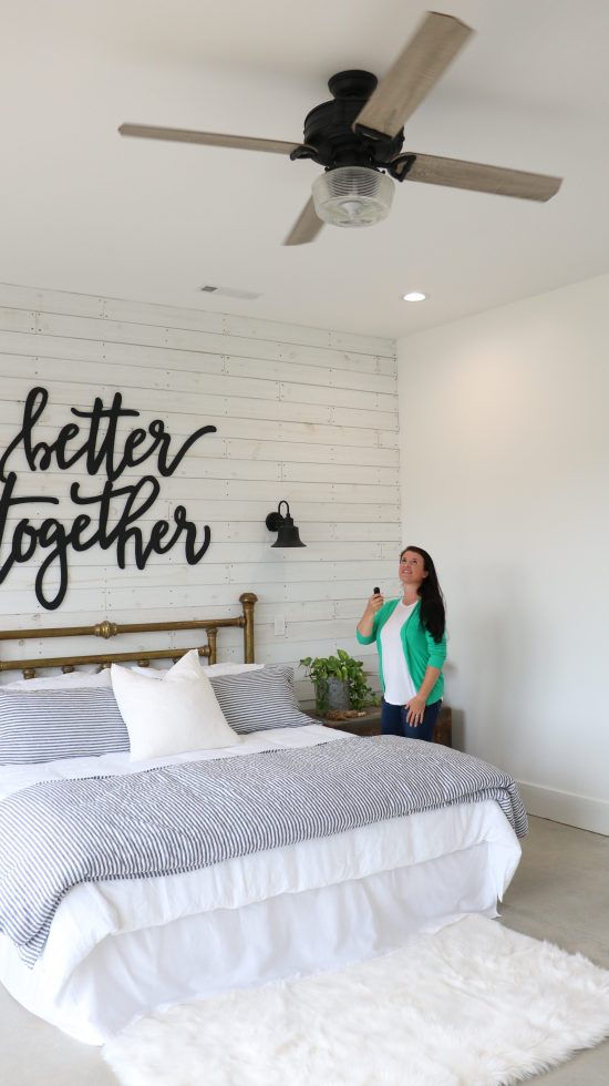 The Brunswick Fan from Hunter Fan Company is placed over the bed in this guest bedroom, pictured.