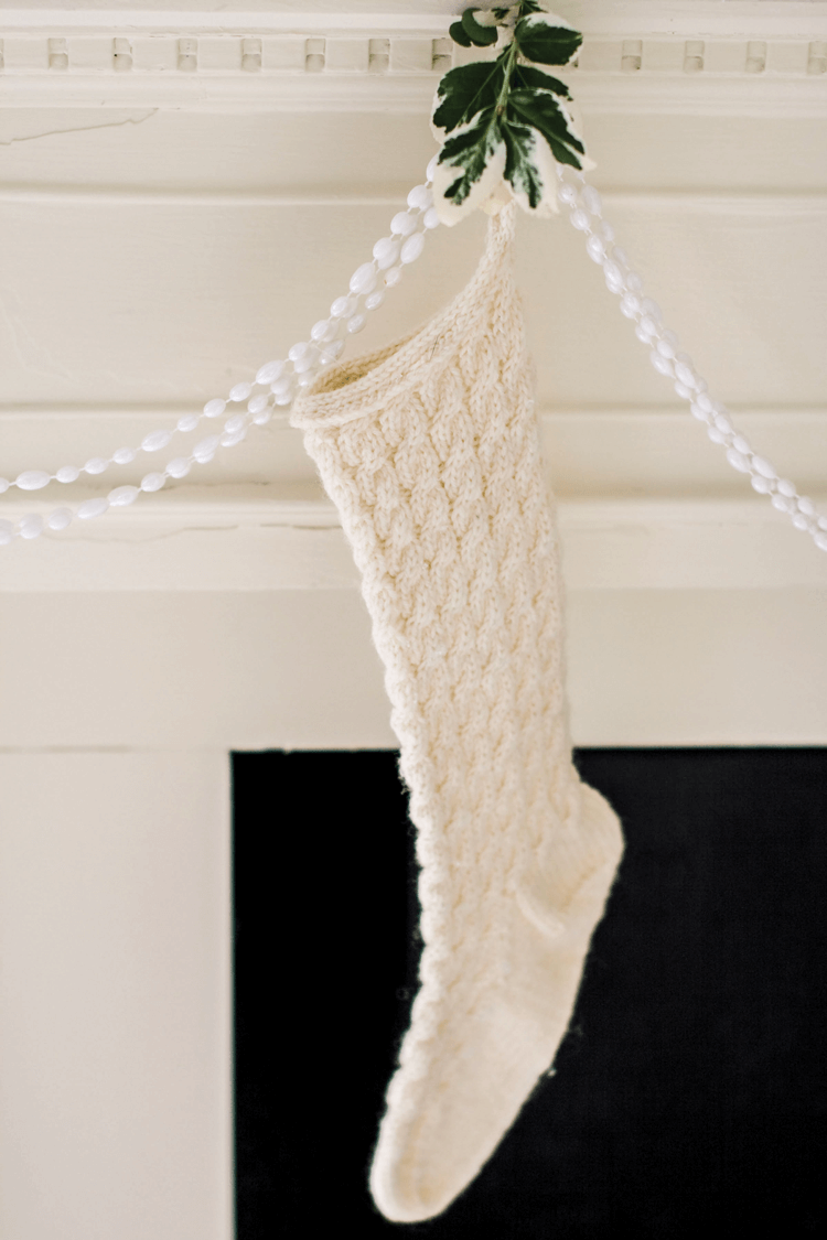 As high points you can add stockings knitted from wool or made from white linens.