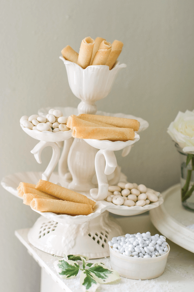 A LEEDSWARE TIERED DISPLAY holds sweets like baked cookies and Christmas biscuits.