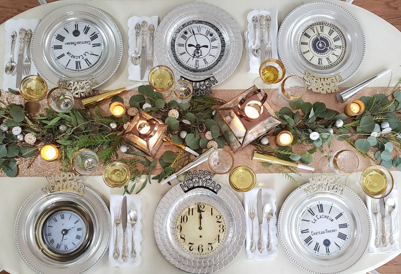 Fun clock plates, glittery details, candlelight and mixed metals at this New Year’s Eve table provide guests with a dreamy start to the new year.