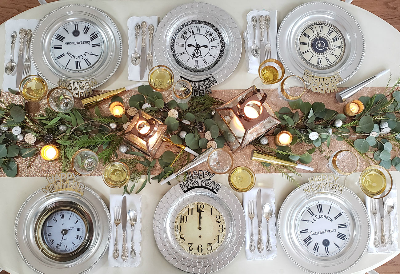 Fun clock plates, glittery details, candlelight and mixed metals at this New Year’s Eve table provide guests with a dreamy start to the new year.