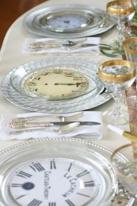 Don’t be afraid to mix and match plates, glasses and other tableware. It only adds to the interest of the New Year's Eve tablescape.