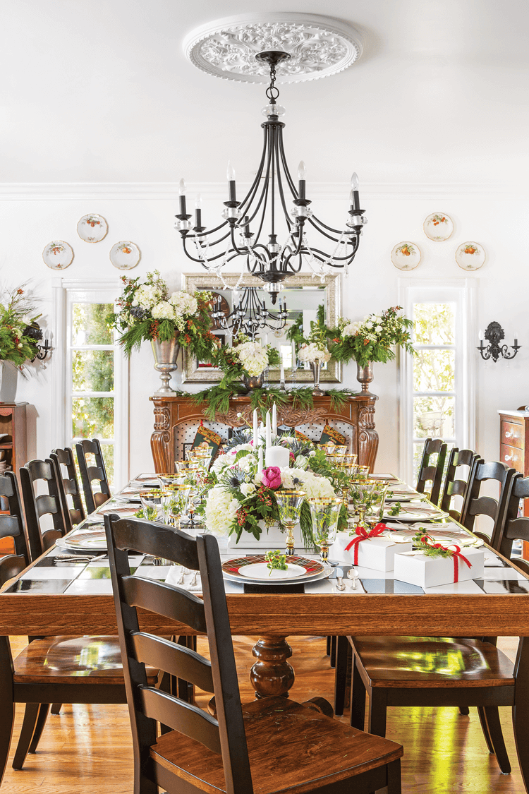 JANICE’S HUSBAND MADE THE TABLETOP of the dining table, which features classic white-and-black tile.