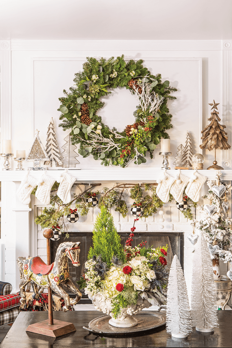 JANICE COLLECTS THE TWIGS AND PINECONES for her wreaths year round. Her home displays all her unique creations.