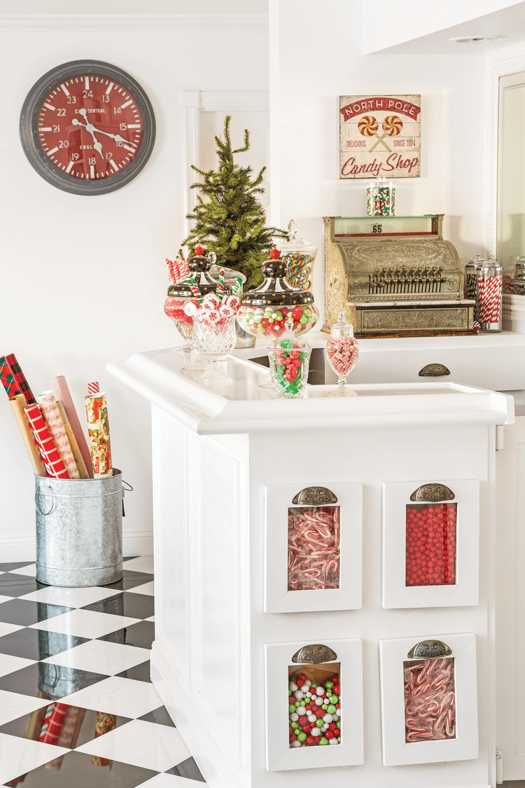 AS A CHILD, JANICE LOVED SODA FOUNTAINS. Her family’s display is replete with its own five-and-dime cash register and yummy Christmas candies.