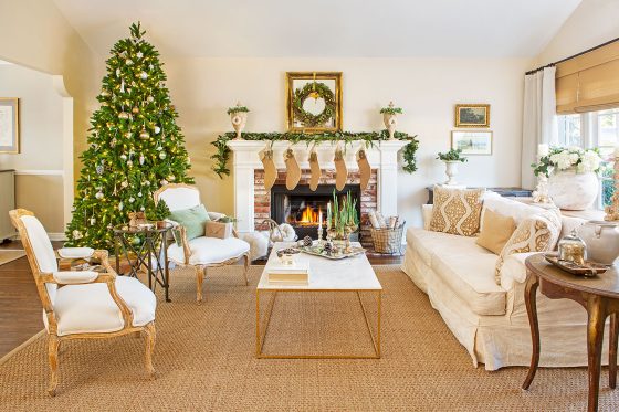 Neutral and natural Christmas decor give this living room a serene feeling