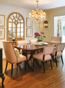 traditional dining room with living coal striped chairs