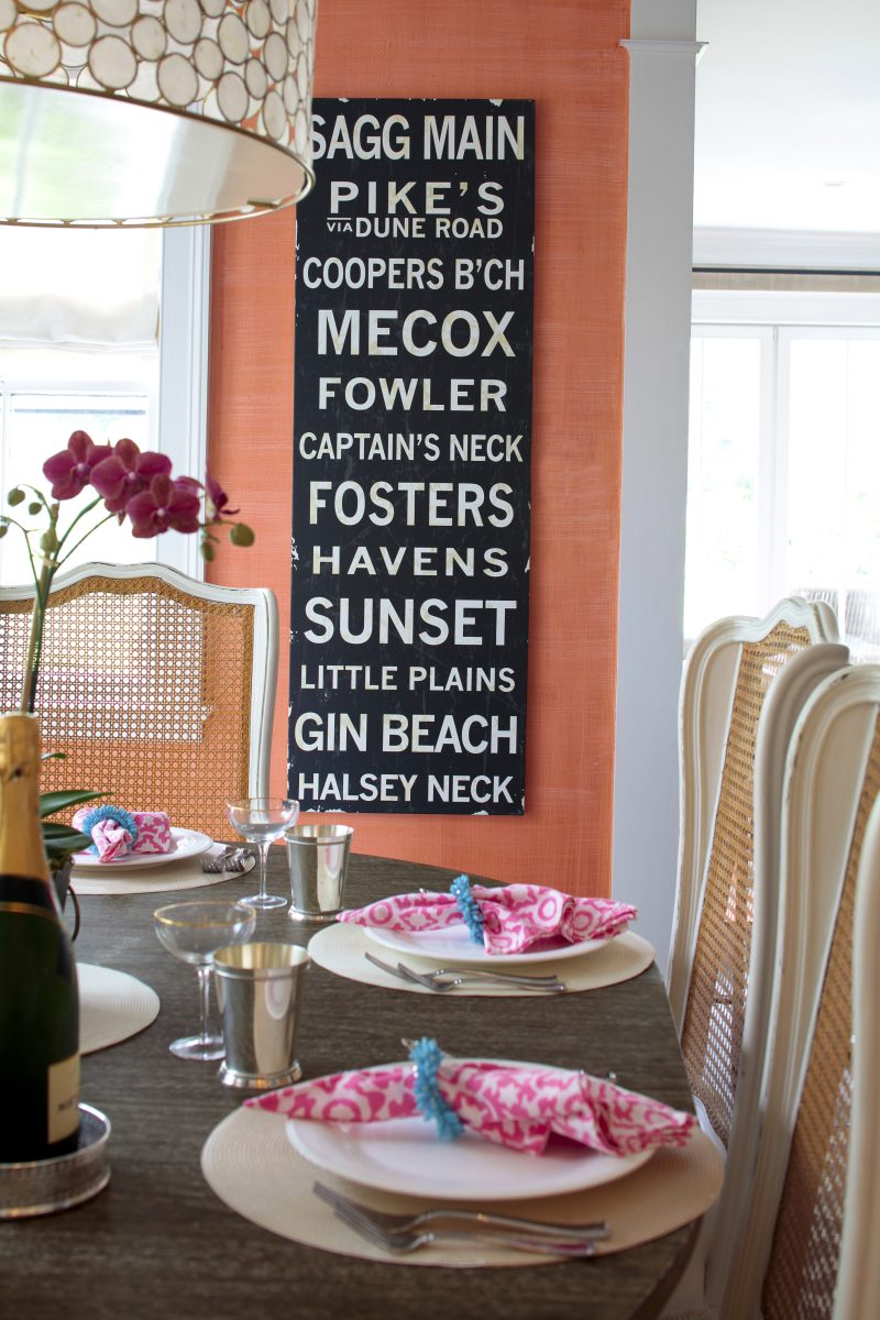 cottage dining room with living coral wallpaper