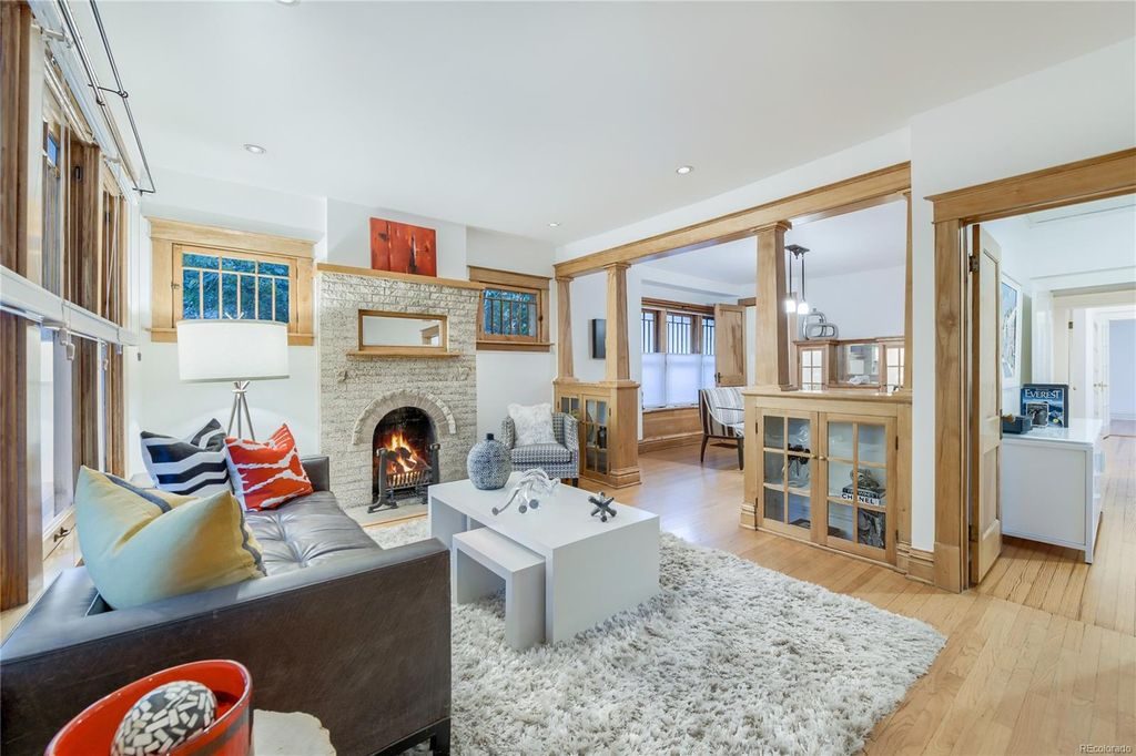 Quaint Denver cottage living room with brick fireplace