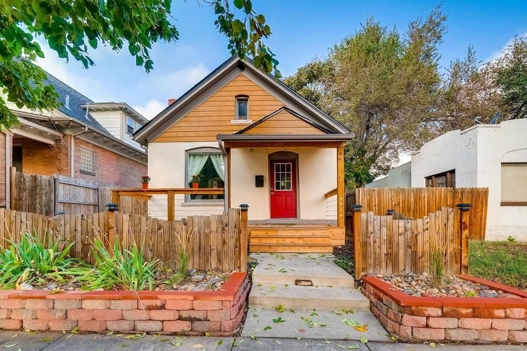 Quaint Denver cottage with an amazing curb appeal.