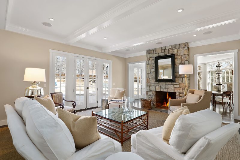 option of a stand-out fireplace with a floor-to-ceiling stone structure. as seen in this past Yankee Barn Homes build. The Project House will boast two amazing fireplaces in the open plan great room.