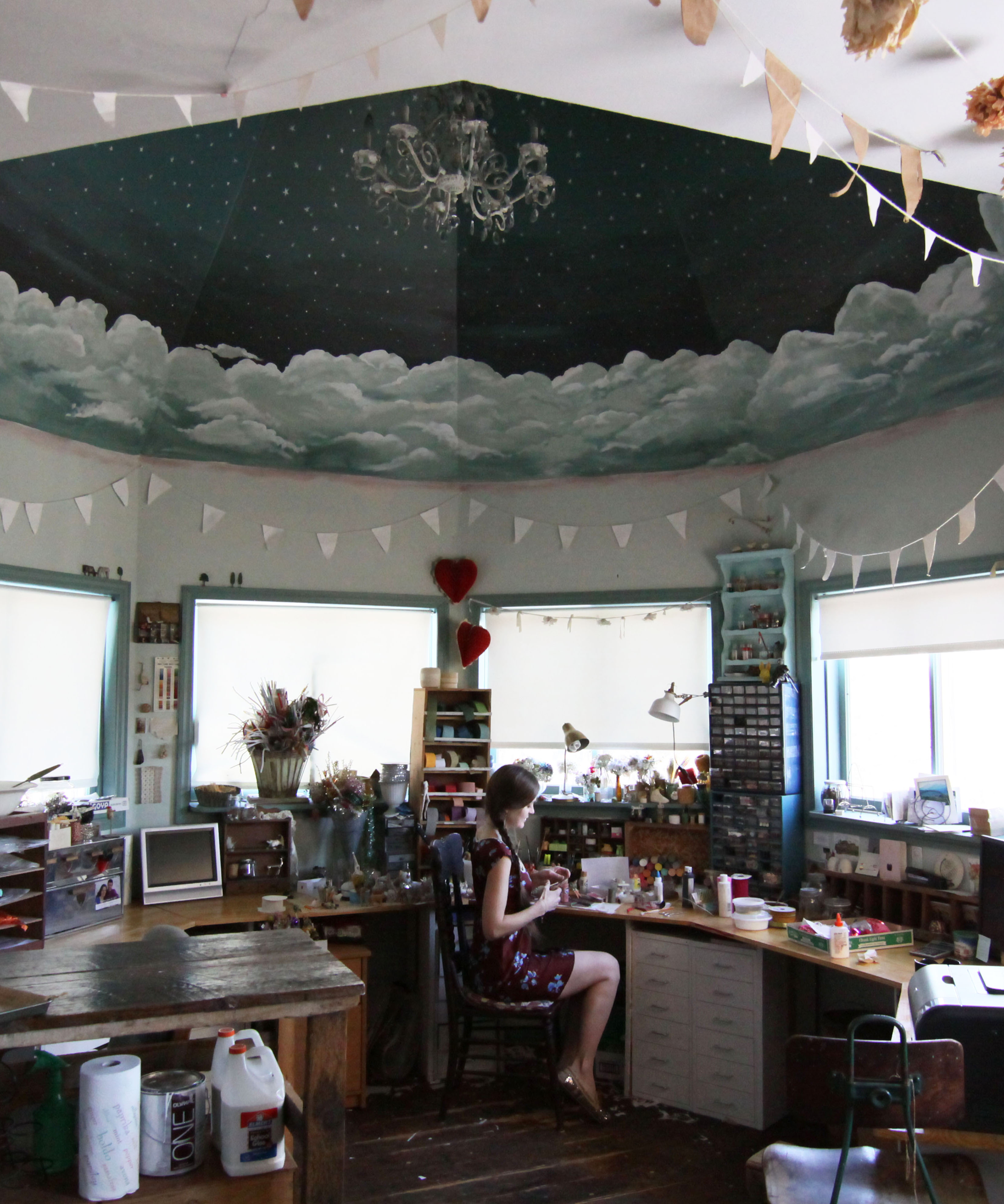 The dome ceiling is painted as a starry night sky in Crystal Sloan's studio space. 