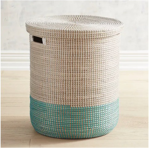 Woven laundry hamper with teal accent on bottom half.