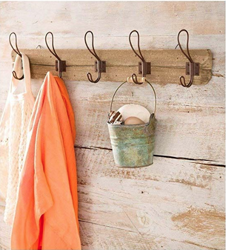 farmhouse style hooks on a wooden mount