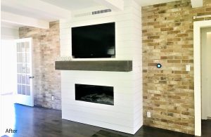 fireplace with shiplap walls