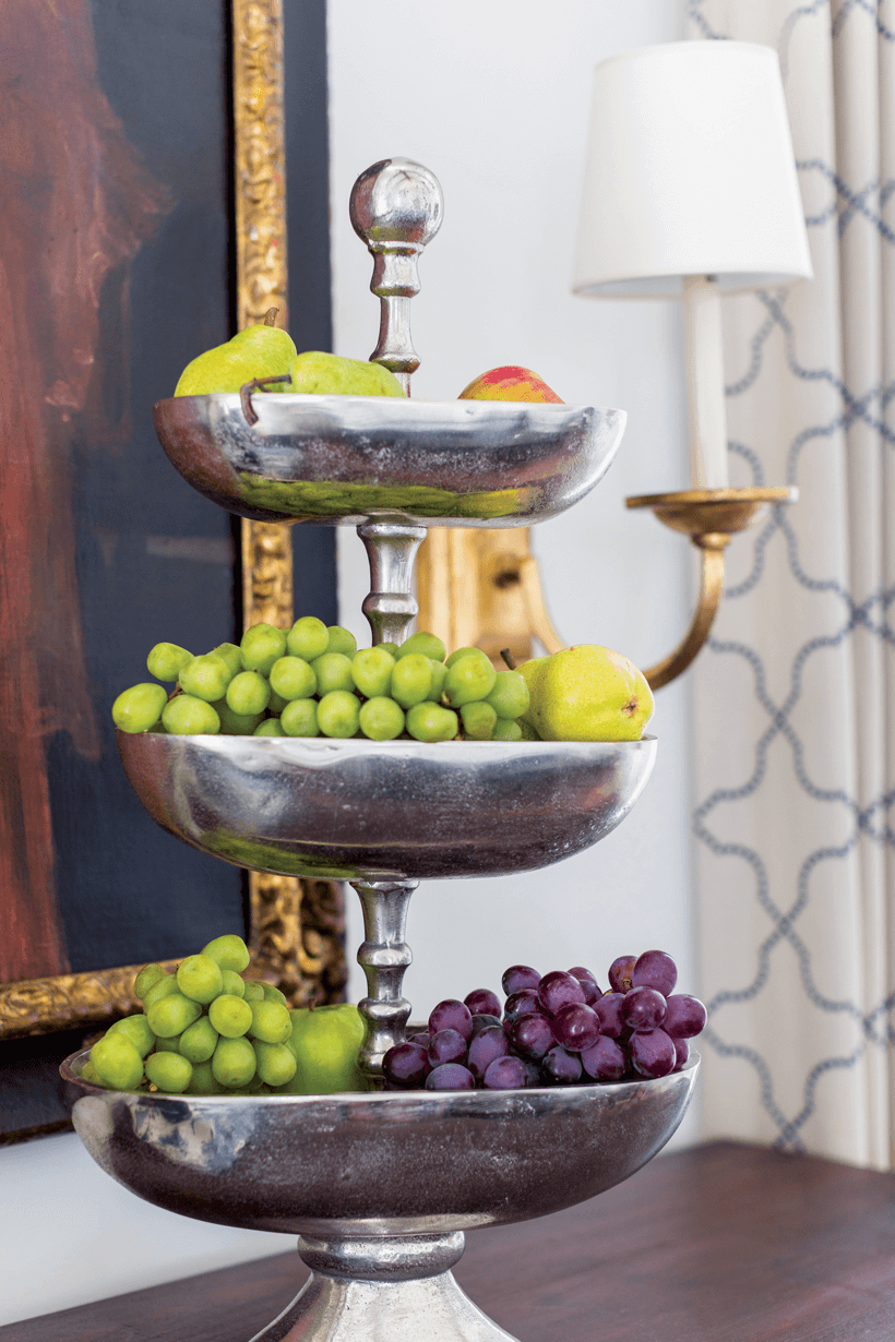 An Italian Baroque-style commode from the 19th-century is filled with fruit.