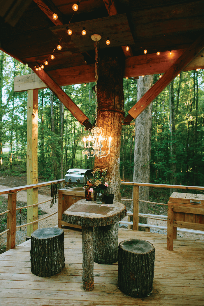 The outdoor dining area offers a covered space to enjoy your meal while experiencing the beauty of nature.