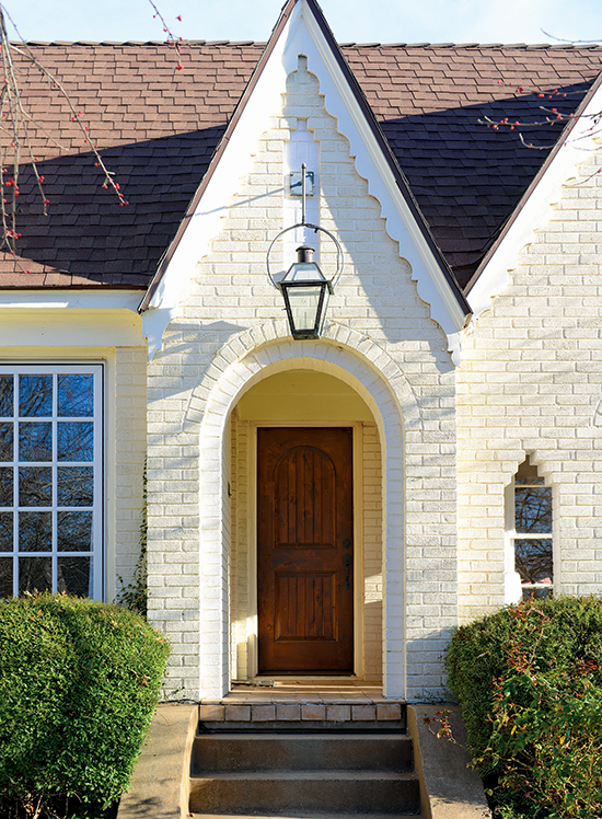 steeple of a brick tudor cottage portico