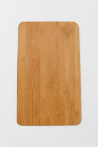 A large bamboo cutting board.
