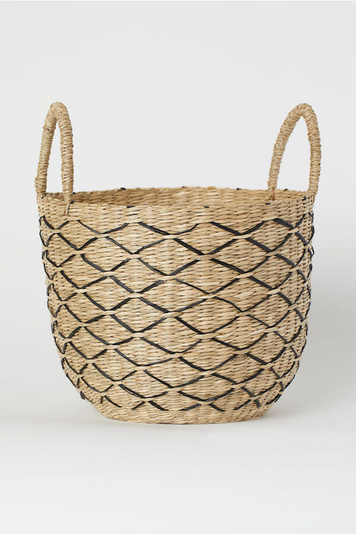 A basket with a black diamond pattern.