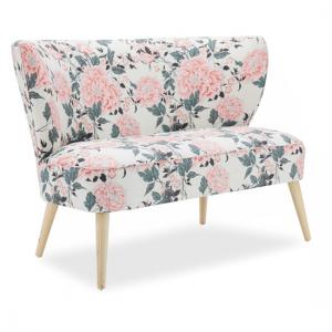Light colored floral upholstered bench with light wooden legs.