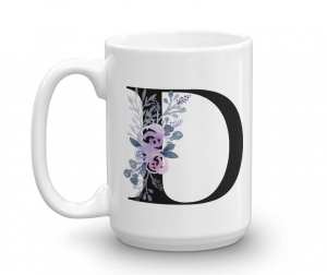 white mug with Black monogram letter D with a lavender floral wreath.