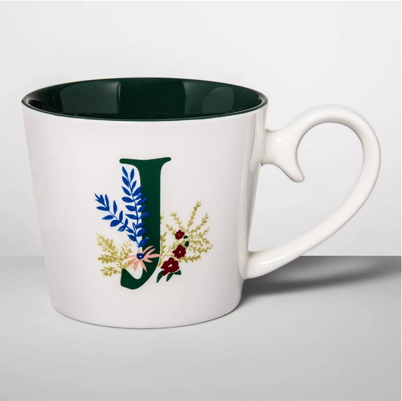 J monogram mug with flora details and green interior