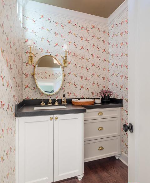 small powder room with hummingbird wallpaper