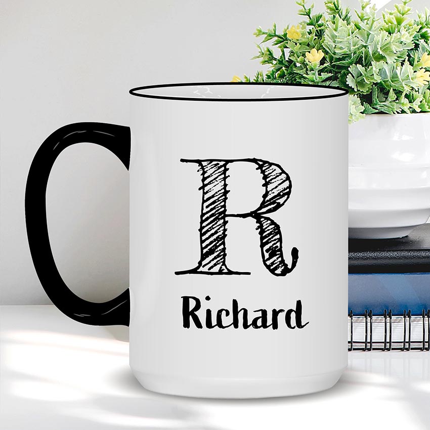 sketch style R mug with black handle