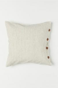 neutral striped pillow cover with wood buttons