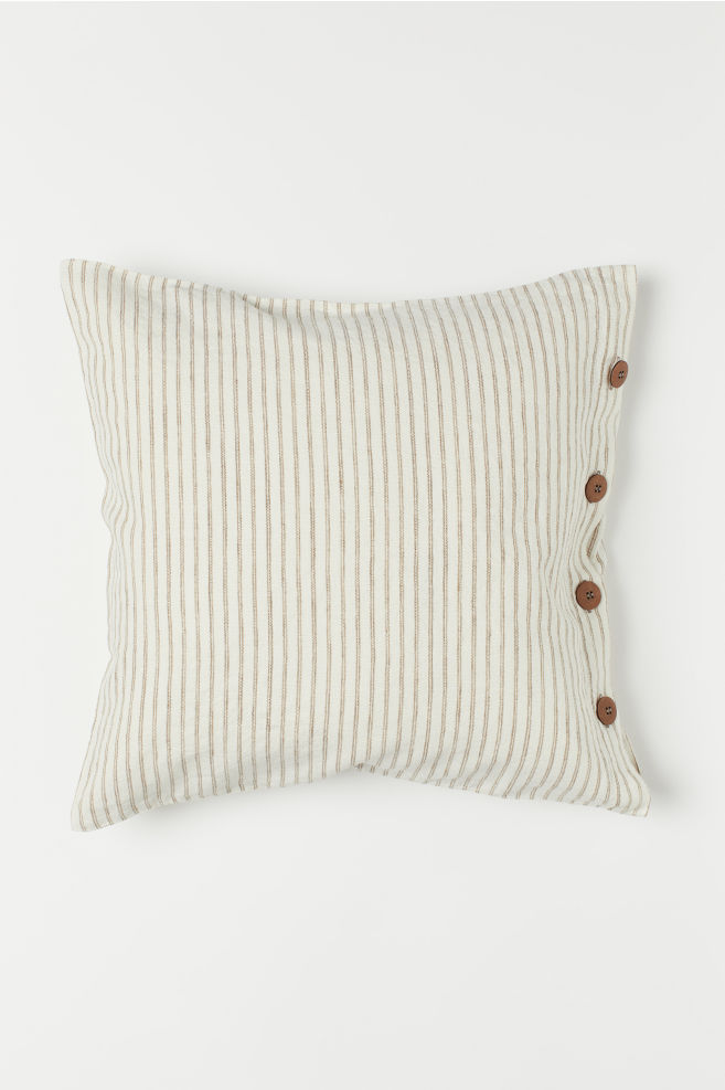 neutral striped pillow cover with wood buttons