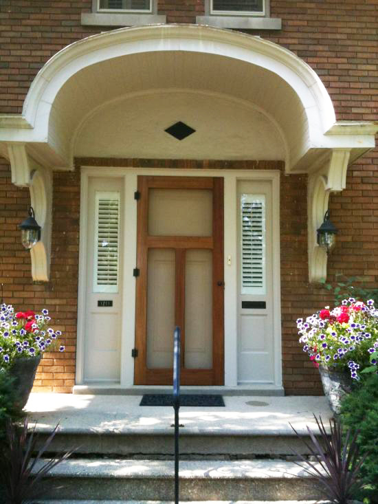 arched portico with vintage door