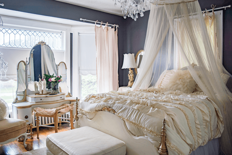 Romantic style bedroom with white accents and gold hardware