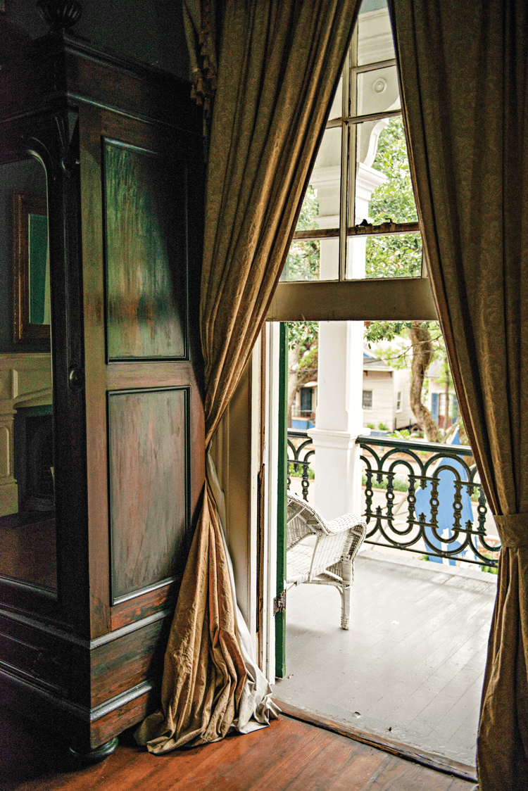 large window with heavy curtains in the Degas house