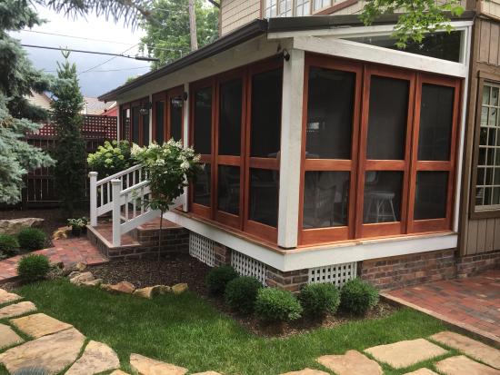 double gardenia screened-in porch side view // vintage doors