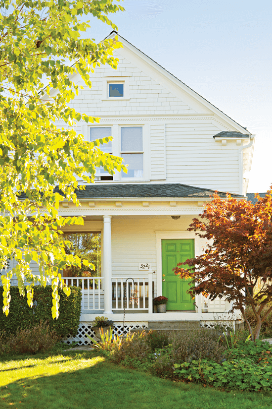 gabled farmhouse with a green door.