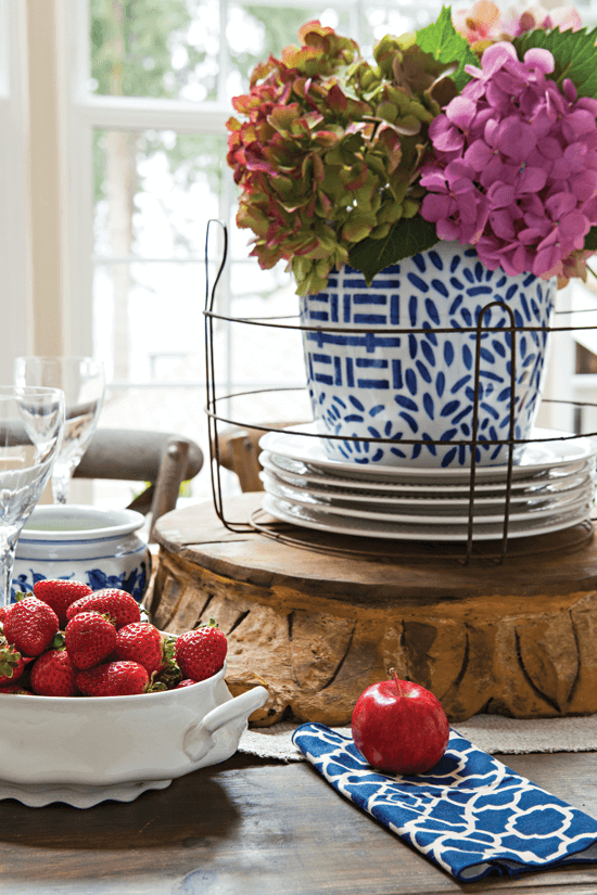 blue and white pot on a farmhouse style dining table