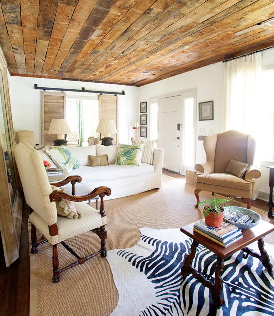 cottage living room with reclaimed wood ceiling