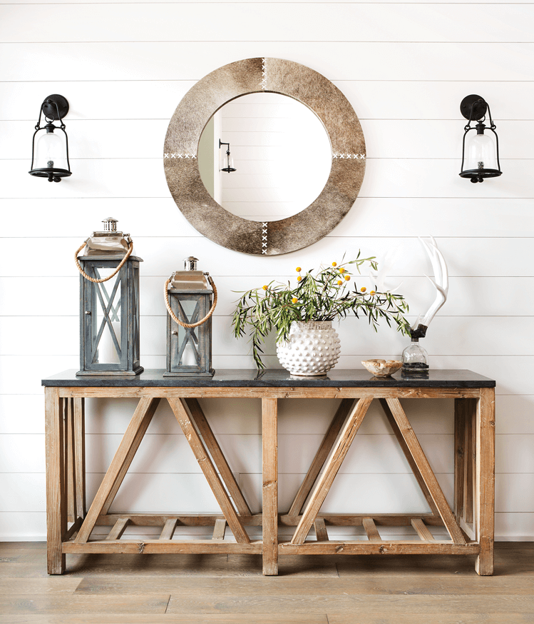 rustic beachhouse entryway featuring orient express console round mirror shiplap and white oak wooden floors 
