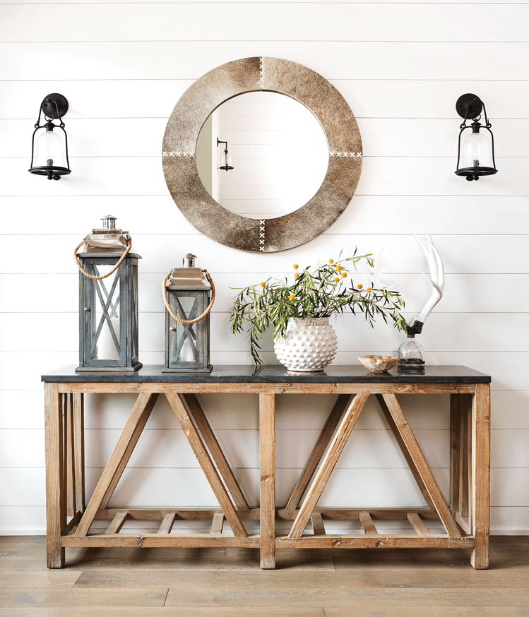 rustic beachhouse entryway featuring orient express console round mirror shiplap and white oak wooden floors