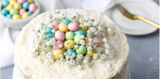 coconut cake with babys breath and candy eggs